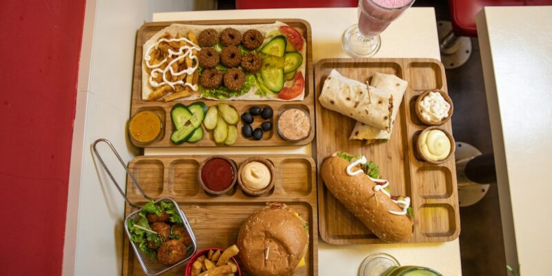 A tray of food and drinks on a table.