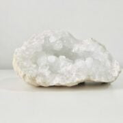 A white rock with crystals.