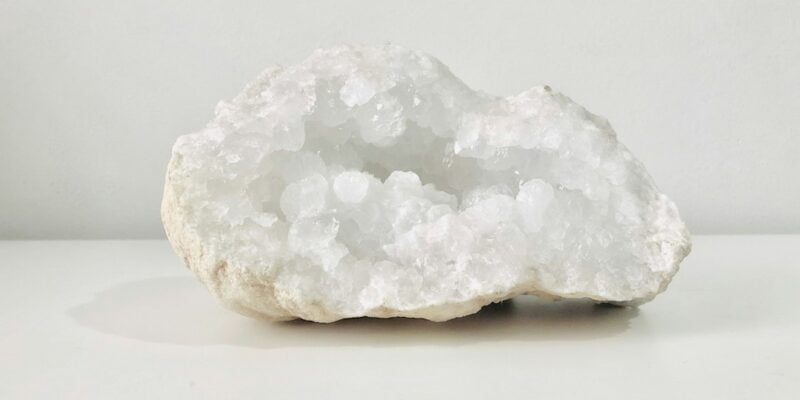 A white rock with crystals.