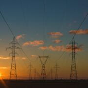 High voltage pylons at sunset.