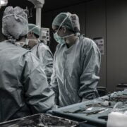 A group of surgeons in an operating room.