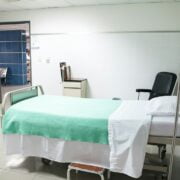 A hospital bed in a room.