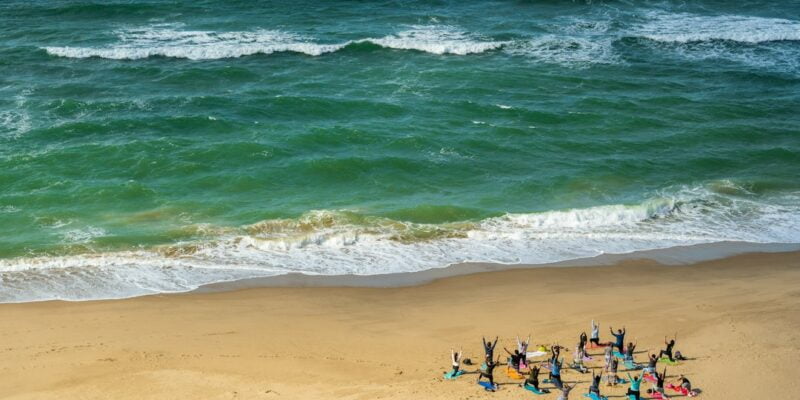 A group of people on a beach.