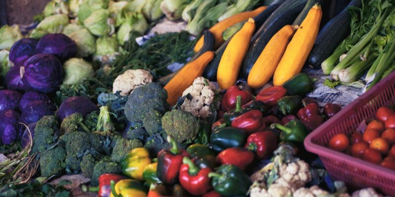 A pile of vegetables on a table.