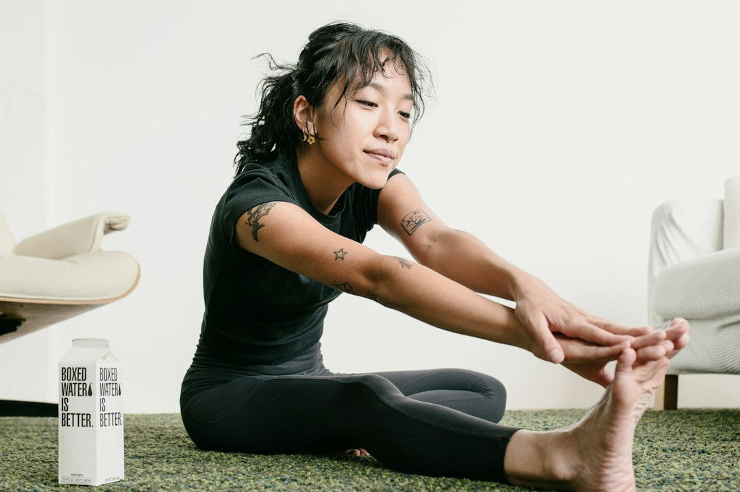 A woman sitting on the floor.