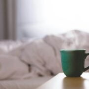 A cup of coffee on a table.