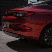 The rear end of a red 2020 hyundai elantra.