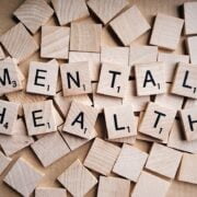 The word mental health spelled out in wooden blocks.