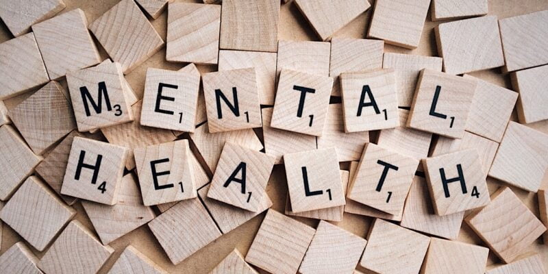 The word mental health spelled out in wooden blocks.