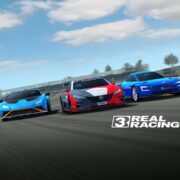 Three racing cars—blue, red, and blue—speed down a track on a clear day. The blue car on the left is sleek, the red car in the center is bold with a prominent logo, while the blue car on the right flaunts a sporty design. The "Real Racing 3" logo captures that exhilarating need for speed mobile vibe.