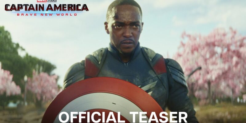 A man in a superhero outfit holds a shield, with "Captain America: Brave New World" and "Official Teaser" text overlaying the image.