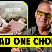 A man wearing sunglasses is pictured twice, once reading papers with a Hollywood sign in the background, and once speaking. Text overlay reads, "I HAD ONE CHOICE.