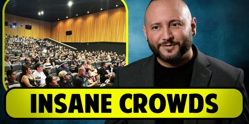 A man in a suit stands beside an image of a packed movie theater. The text reads "INSANE CROWDS.