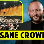 A man stands next to an inset image of a crowded theater. Text reads, "Insane Crowds.