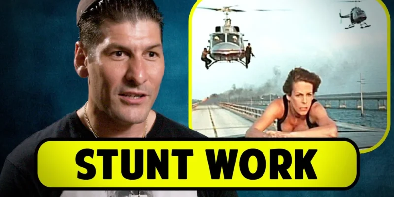 Man speaking with an image of a stunt scene involving helicopters in the background. Text reads "Stunt Work".