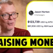 Man with glasses next to fundraising details: $123,739 USD by 679 backers, $81,906 USD by 464 backers, as of May 1, 2023. Text overlay reads "RAISING MONEY.