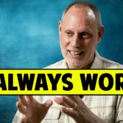 A man with a bald head and a grey beard smiles and gestures with his hands. The text "IT ALWAYS WORKS" is prominently displayed in large, yellow letters across the image.